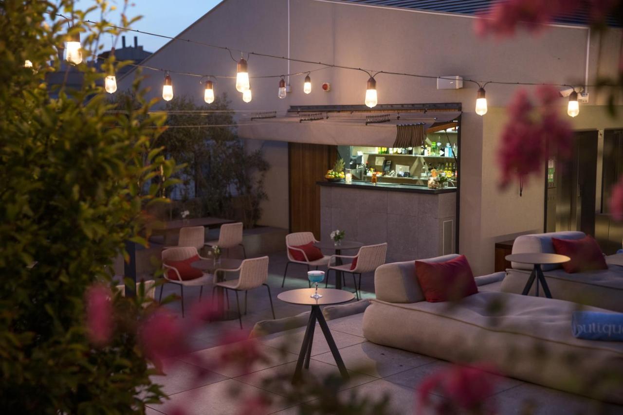 فندق أوهلا إيكزامبل برشلونة المظهر الخارجي الصورة The rooftop bar at the Hotel